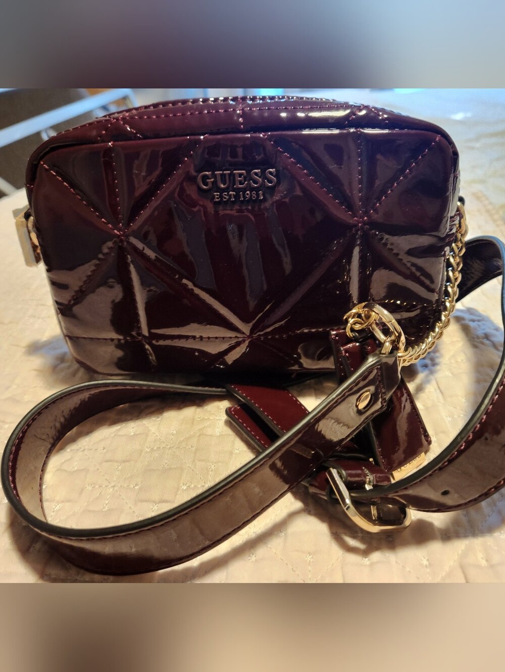 GUESS Quilted Patent Crossbody in Deep Wine with Gold Hardware